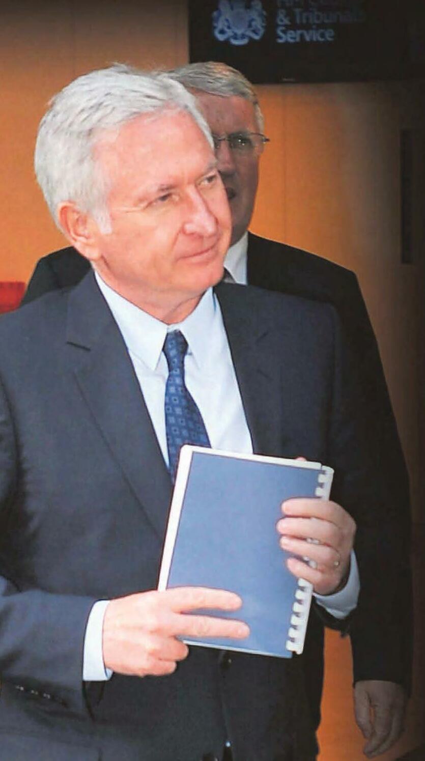 IRISH BILLIONAIRE FINED FOR ATTACK ON FEMALE BAILIFF