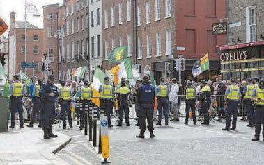 Trio arrested amid scuffles at protest