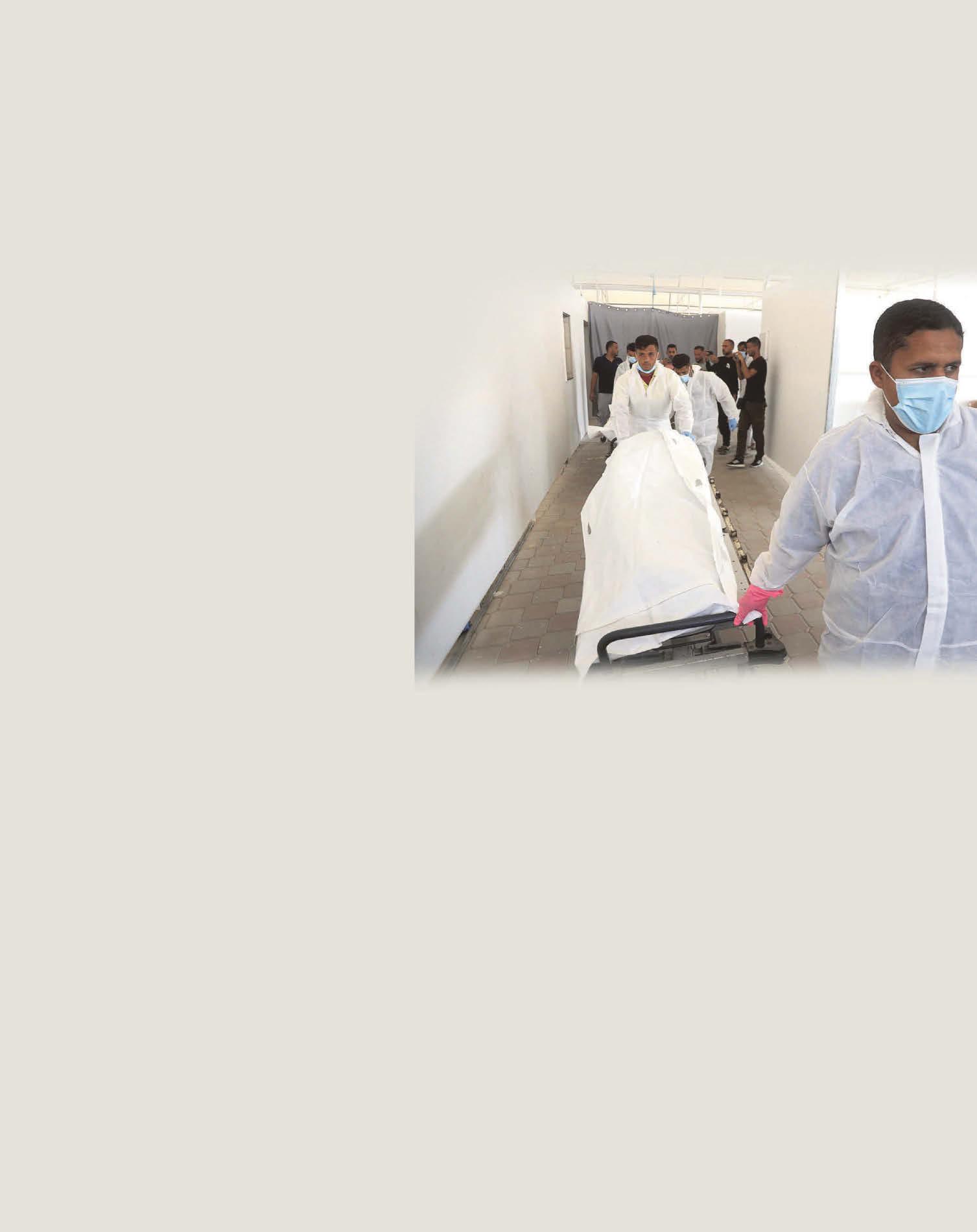 GRIM EXCHANGE OF REMAINS IN GAZA