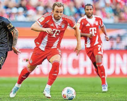 Kane supplies bullets to keep Bayern firing