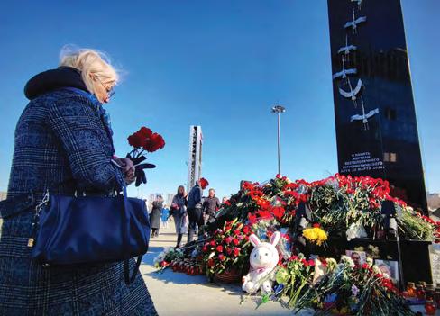 Hundreds pay tribute to deadly Crocus attack