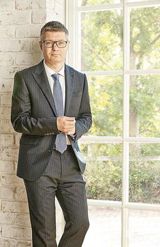 Next hits a profit milestone