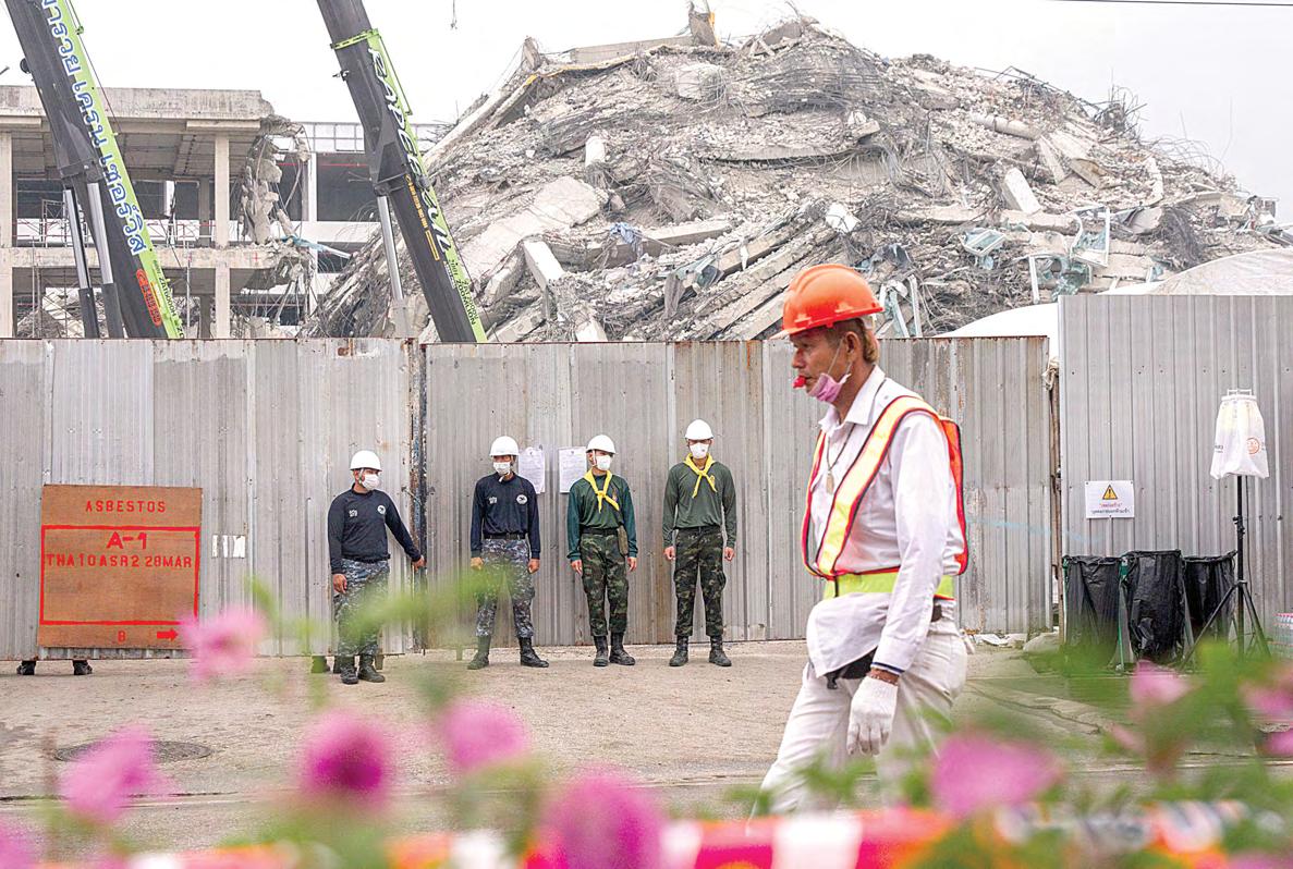 Tower collapse puts builder in spotlight