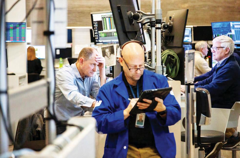 Global markets reel as tariffs begin