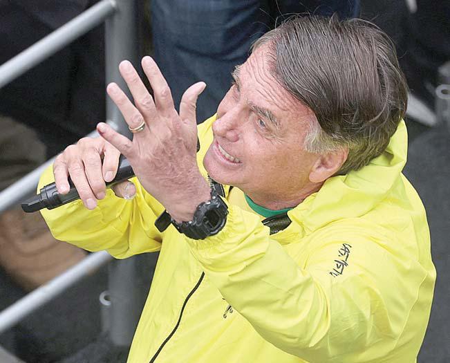 Bolsonaro whips up huge protest over coup charges