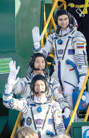 'Soyuz' docks at ISS with American, two Russians
