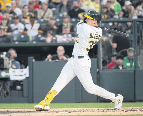 A's pound Padres to get first home win