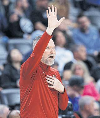 Nuggets go trigger-happy, fire Malone and Booth