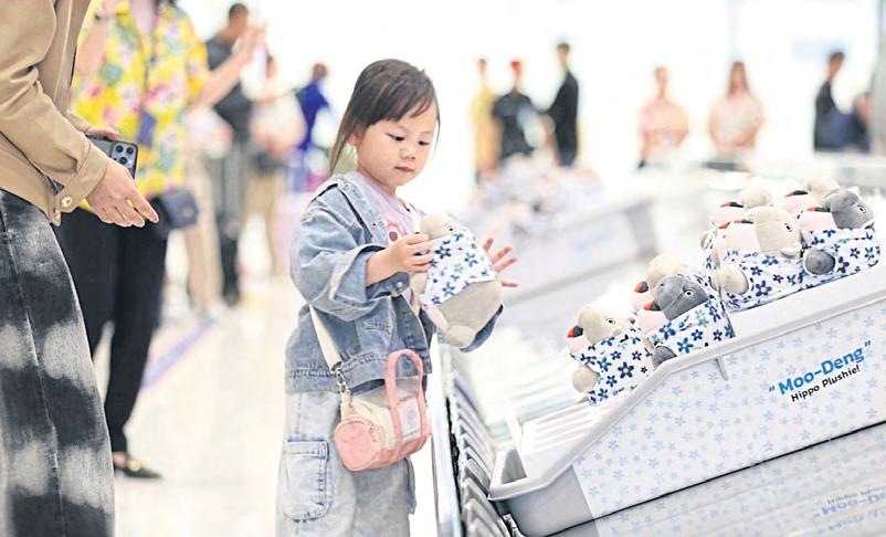 Moo Deng dolls greet air travellers