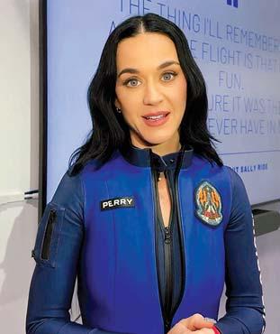 Pop star Katy Perry roars into space on all-woman flight