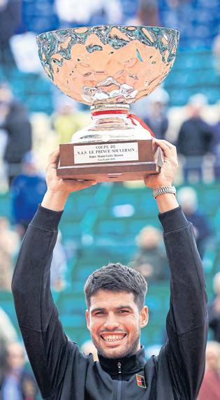 Alcaraz caps a 'difficult week' with elusive title