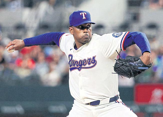 Rocker helps Rangers bury lowly Angels