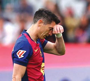 Lewy blow to Barca's quad bid