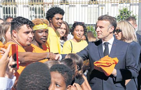 Macron vows to step up reconstruction in Mayotte