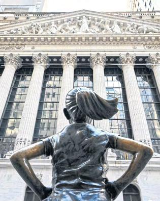 Trump lets up on Powell, China