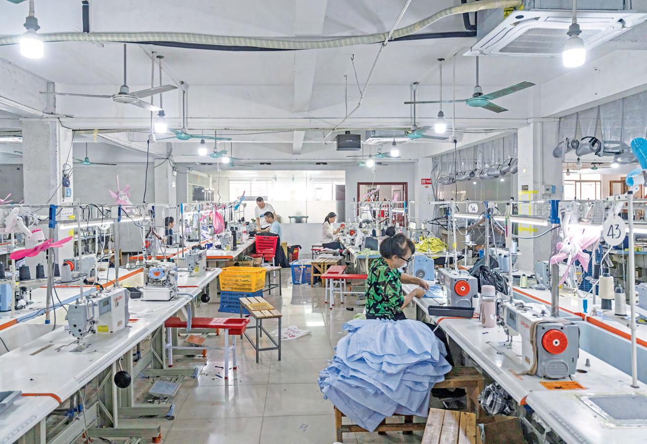 China's output slows as trade war takes toll