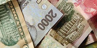 Moody's cuts outlook for banks