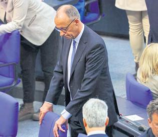 Blow for Merz in vote to lead