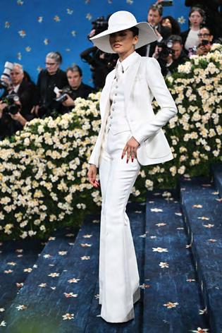 Stars shine at Met Gala, showcasing black dandyism