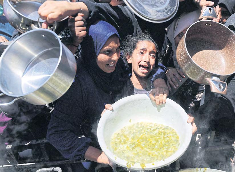 Solution for Gaza aid is 'steps away' as groups raise alarm