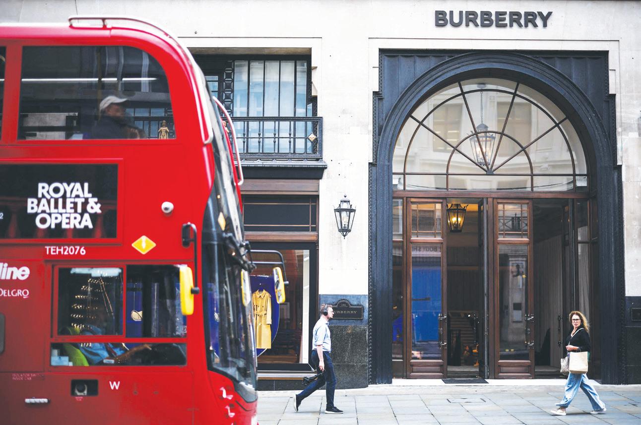 Burberry warns 1,700 jobs at risk after reporting annual loss
