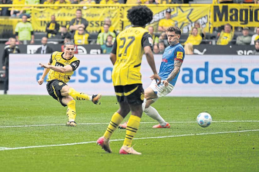 Dortmund complete escape act, punch their ticket to UCL