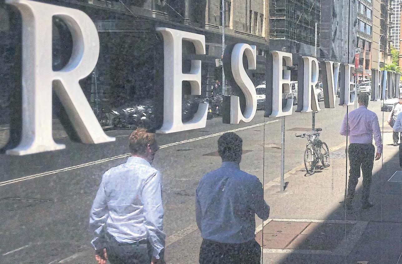 Australia's central bank cuts rates