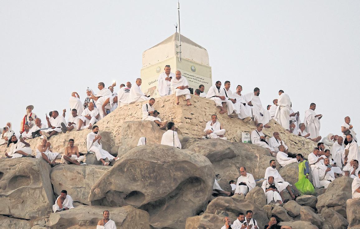 Muslim hajj pilgrims pray at Mount Arafat