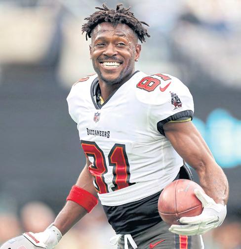 Arrest warrant issued for former NFL star Brown