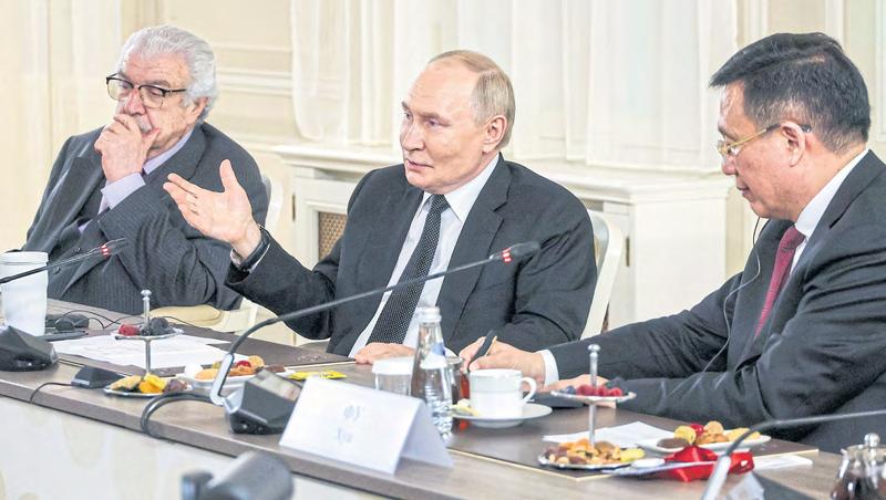 Putin says Nato rearmament ‘not a threat’ to Russia