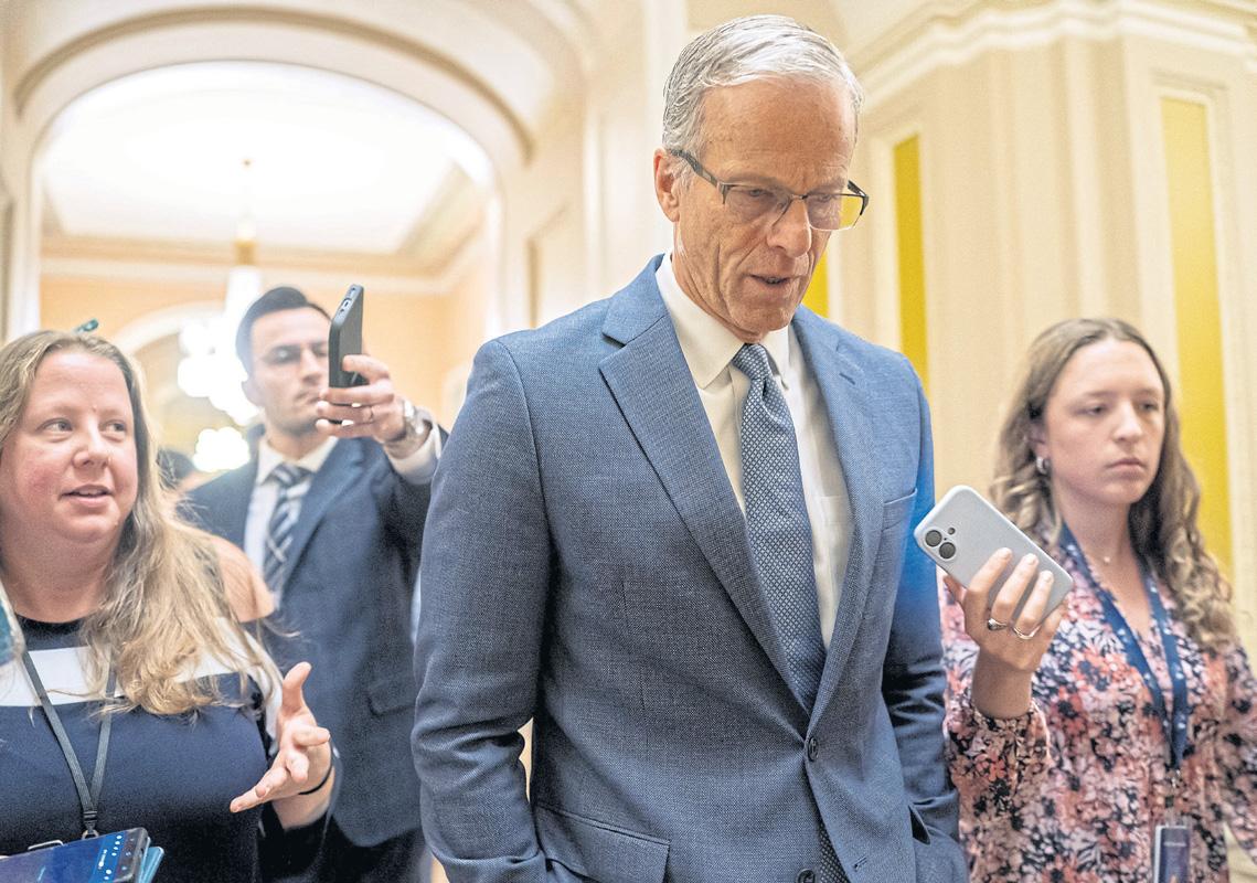 Spending bill vote enters second day