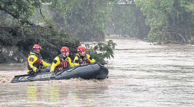 Texas flood toll rises to 24 as missing kids sought