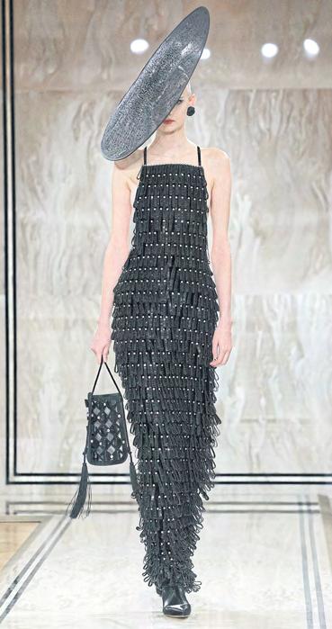Giorgio Armani Prive shows glittering black velvet in Paris