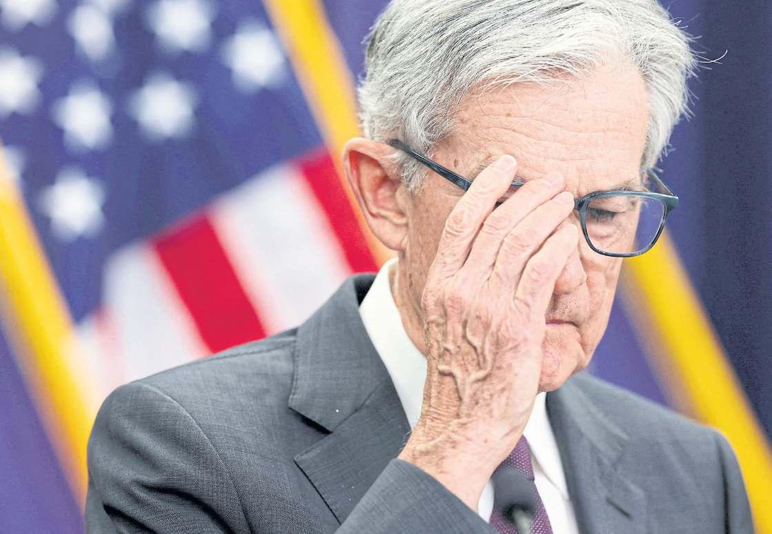 Fed holds rates amid dissent