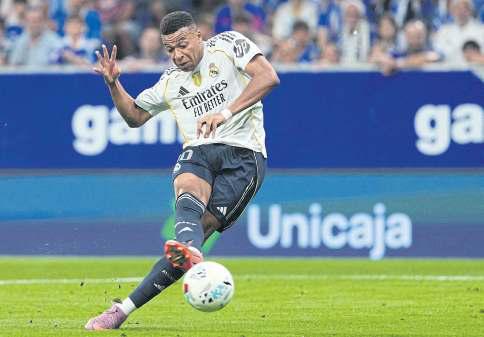 Mbappe double trouble for Oviedo as Vinicius silences fans
