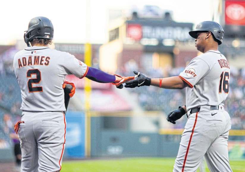 Giants prevail over Rockies amid ejections