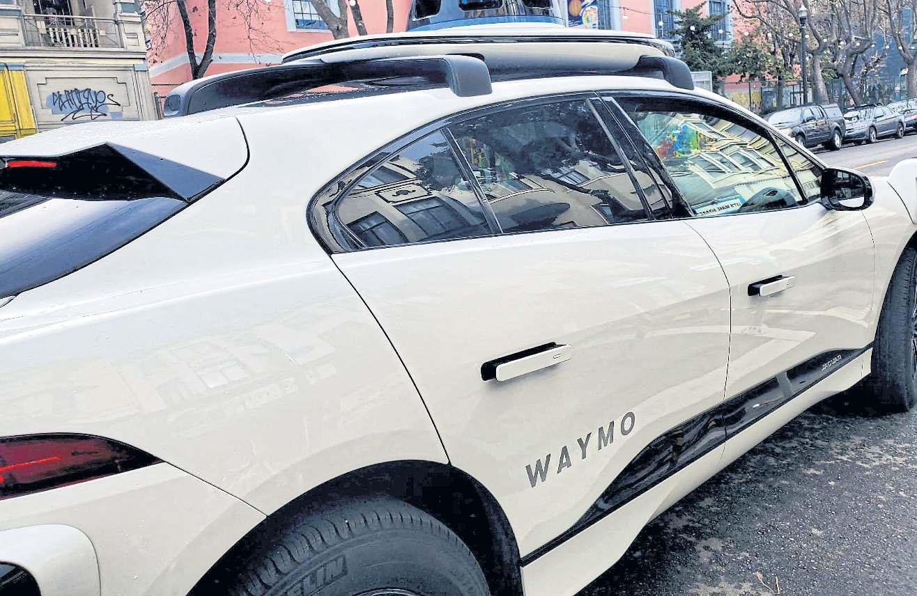 Tesla, Waymo take different routes to robotaxi success