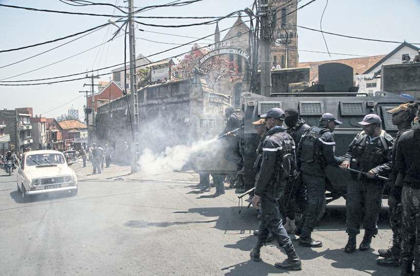Officers fire tear gas at power-cut protest
