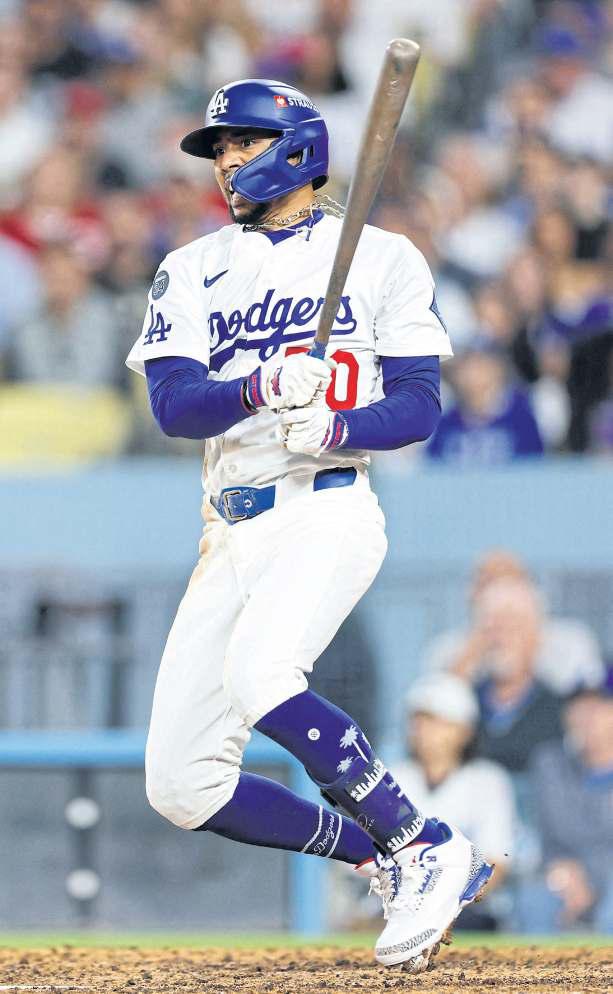 Cool Dodgers crush Reds, Yankees gasp but live on
