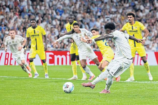Vinicius double lifts Real past Villarreal
