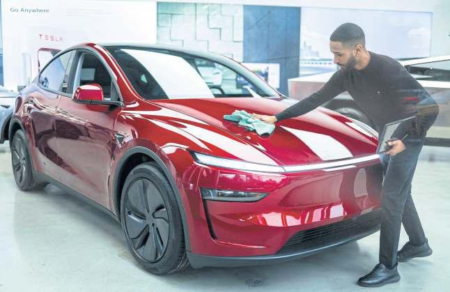 Tesla expected to unveil less expensive Model Y