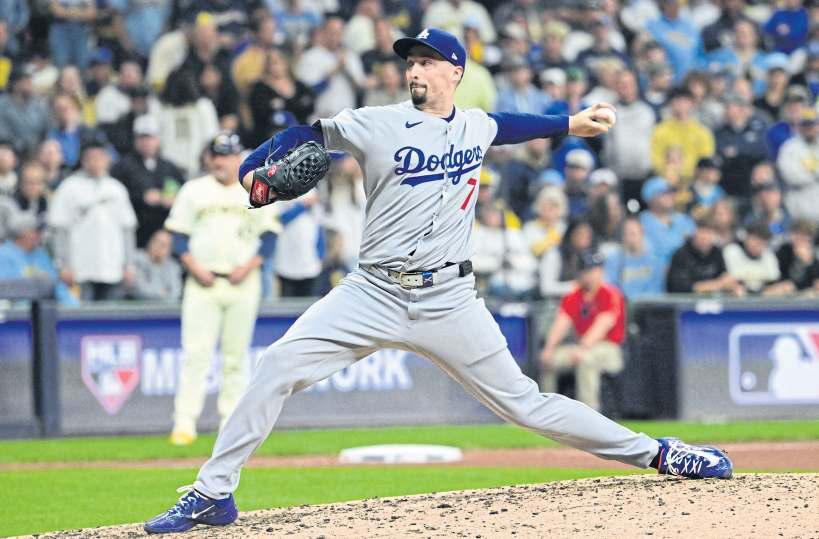 Snell serves up a gem as champs Dodgers survive late scare