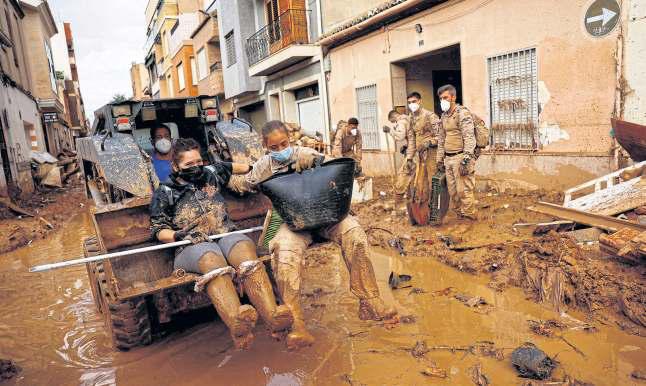 Nation marks a year since deadly floods