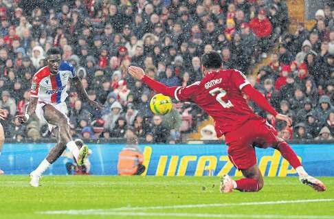 Palace pile more pain on Reds in the rain