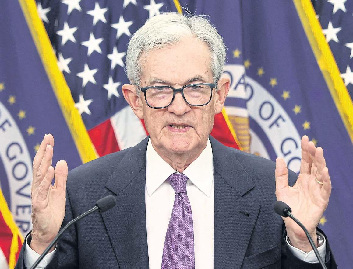 Fed cuts rates, but hints end is near