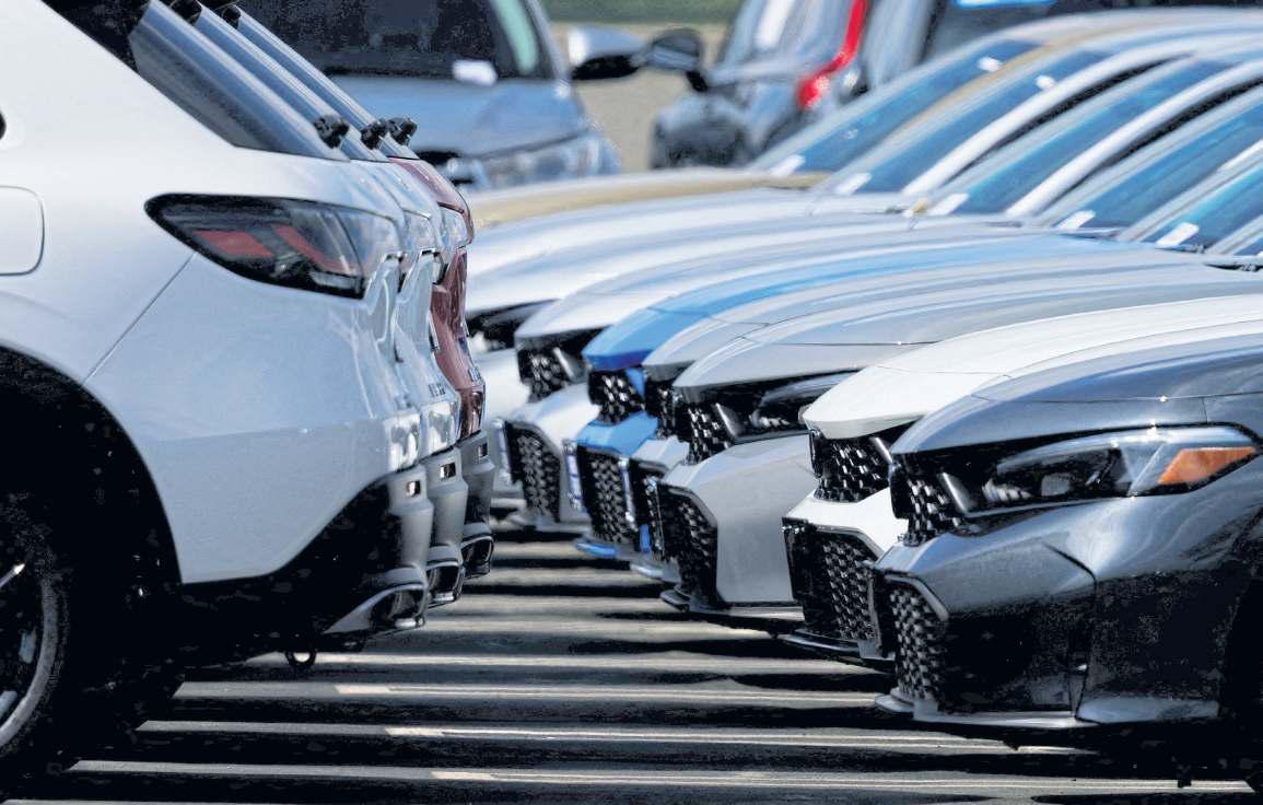 Japan's car firms warn of billions in losses