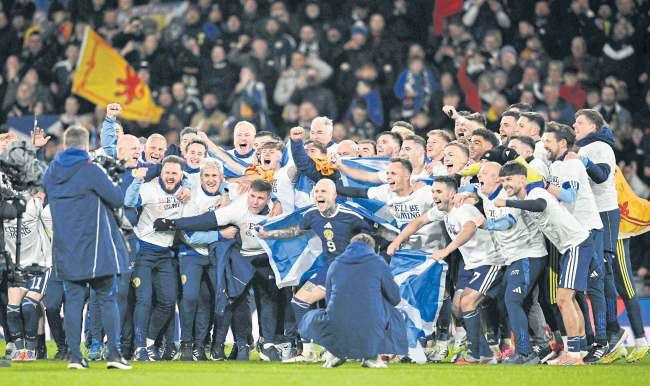 Tierney and McLean send Scots to heaven