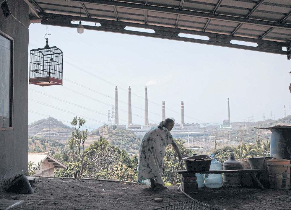 Decades-long deals chain Asia to coal-fired power