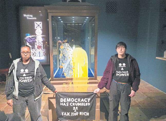 Four arrested in Crown Jewels protest