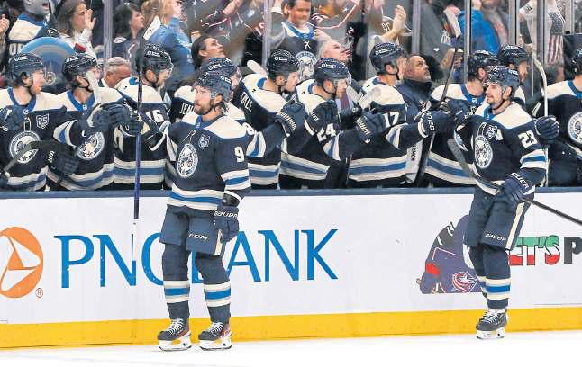 Jackets rally to top Islanders
